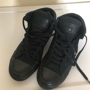 Black mid high top Converse